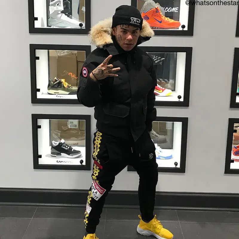 6ix9ine outfit in Canada Goose, Philipp Plein, and Adidas, 2018
