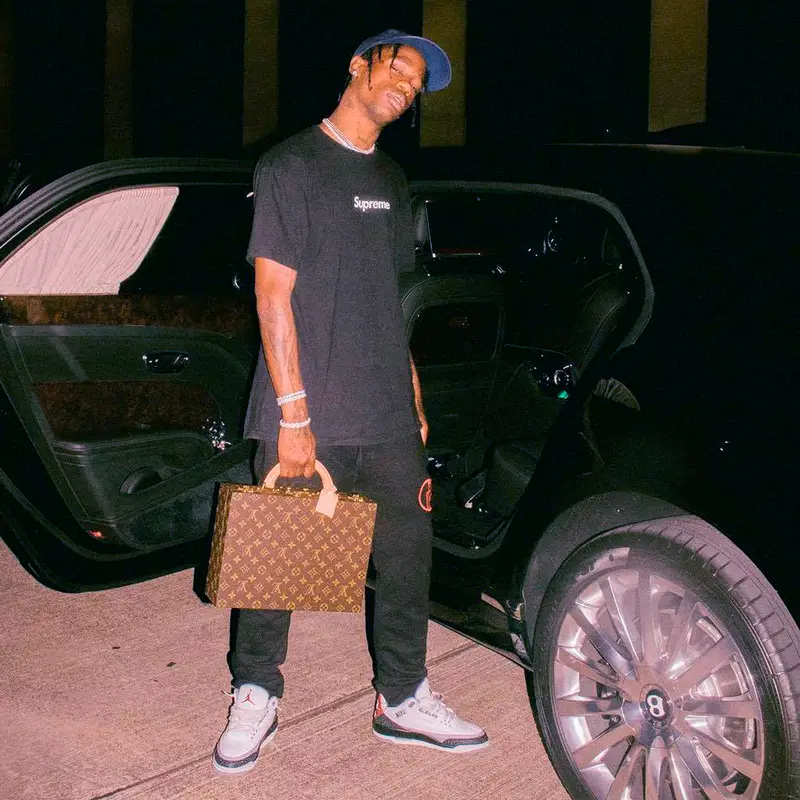 Travis Scott outfit in Supreme, Gosha Rubchinskiy, and Uncle Paulie’s Deli, 2018