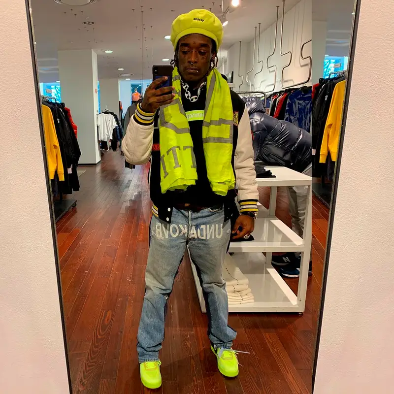 Lil Uzi Vert outfit in Kenzo, Louis Vuitton, and Stussy, 2019