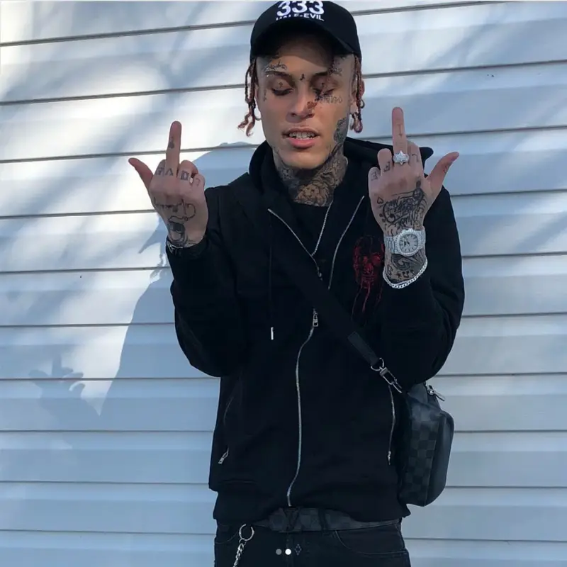 Lil Skies outfit in Alexander McQueen, Louis Vuitton, and Half Evil 333, 2018