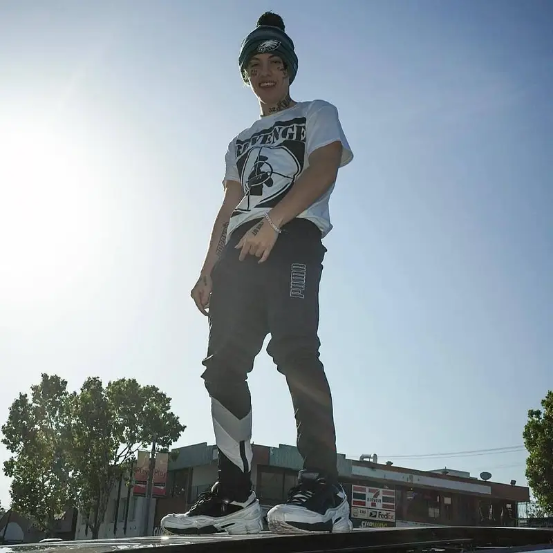 Lil Xan outfit in Public Enemy, New Era, and REVENGE, 2019