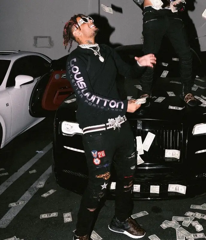 Smokepurpp outfit in Gucci, Louis Vuitton, and Supreme, 2018
