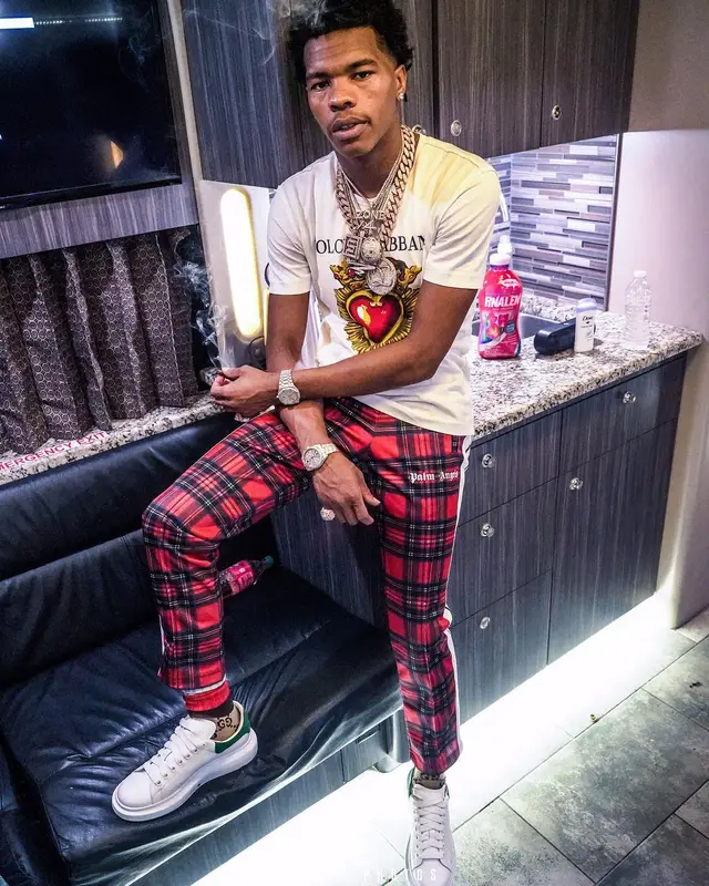 Lil Baby outfit in Dolce & Gabbana, Palm Angels, and Gucci, 2018