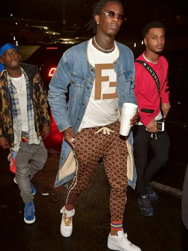 Young Thug outfit in Cease±Desist, Gucci, and Nike, 2019