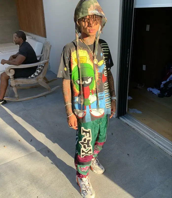 Swae Lee outfit in Vintage, Fox Racing, and Balenciaga, 2018