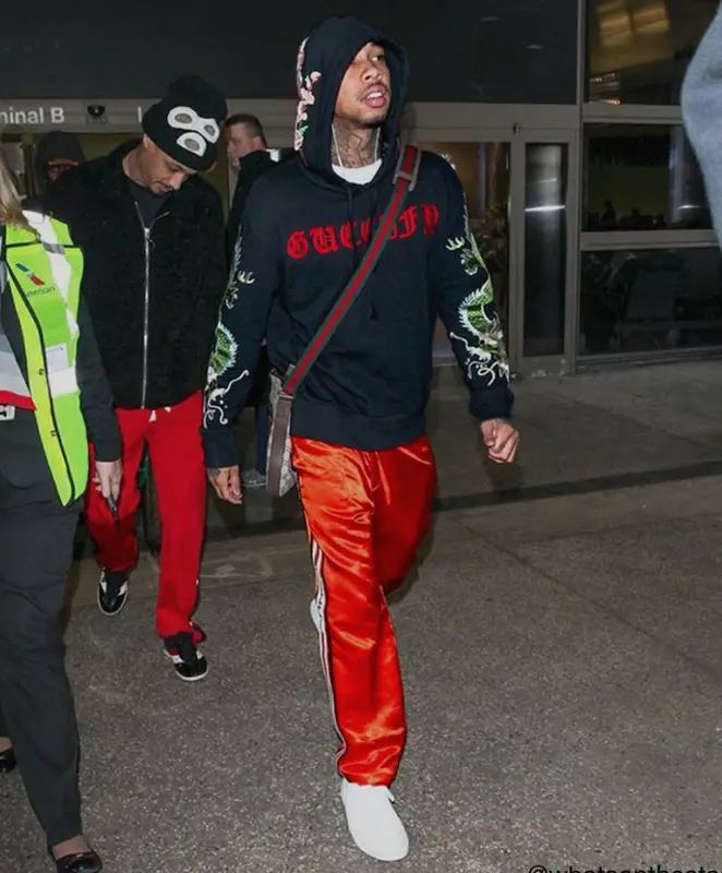 Tyga outfit in Gucci and Common Projects, 2018