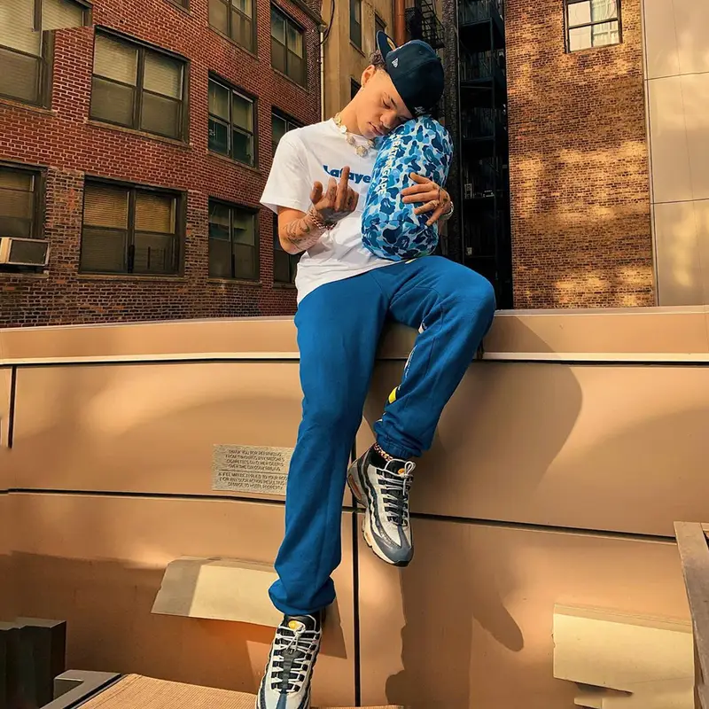 Lil Mosey outfit in New Era, Lafayette, and Bape, 2019