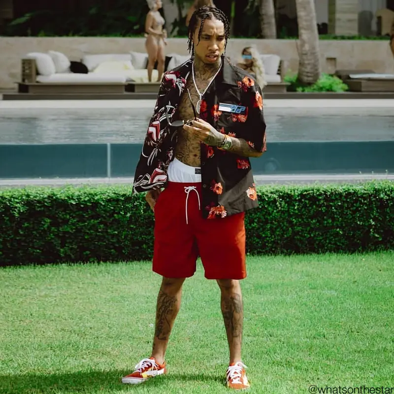Tyga outfit in Prada, Burberry, and Polo Ralph Lauren, 2018