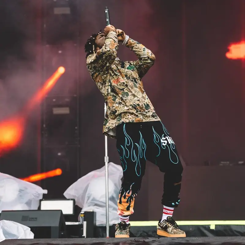 Saint JHN outfit in Christian Sex Club, Heron Preston, and Nike, 2019