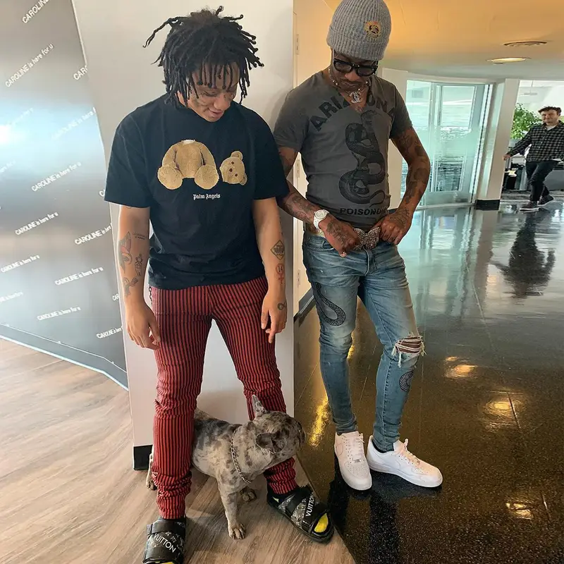 Trippie Redd outfit in Palm Angels, Gucci, and Louis Vuitton, 2019