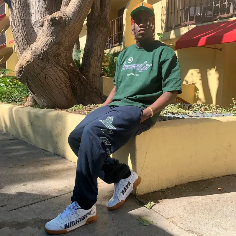 Lil Yachty outfit in Sicko, Reebok, and American Needle, 2019