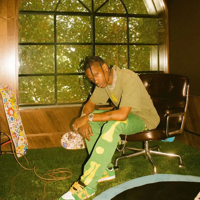 Travis Scott outfit in Stussy, Louis Vuitton, and Takashi Murakami, 2019