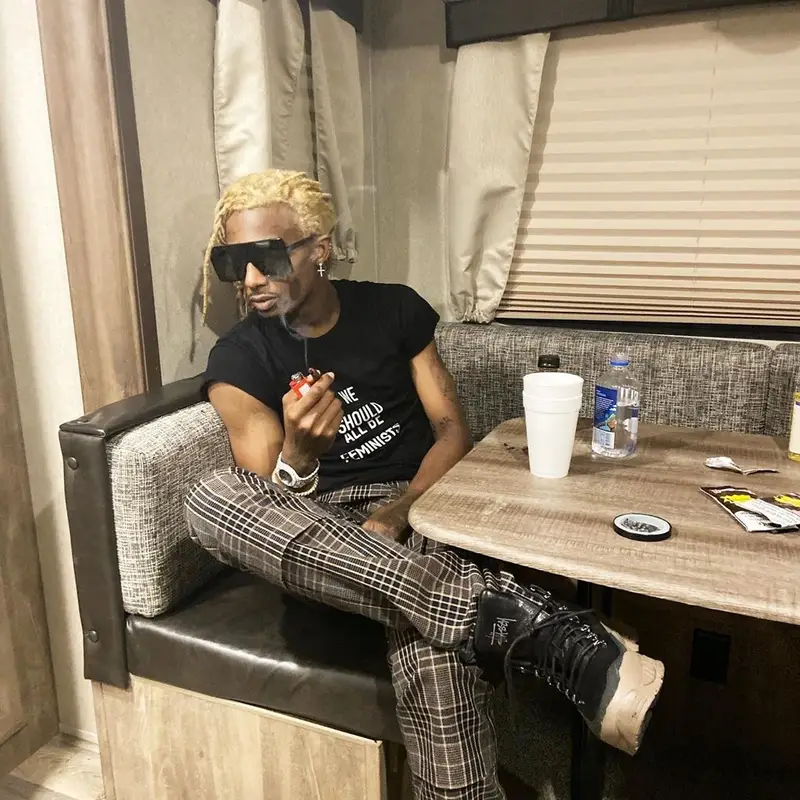 Playboi Carti outfit in Dior, Raf Simons, and Saint Laurent, 2019