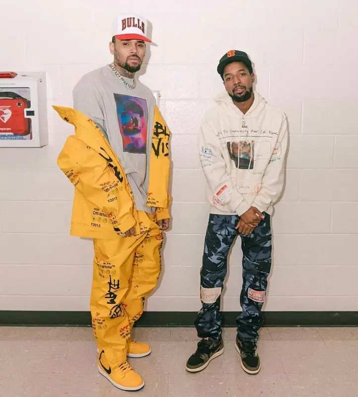Chris Brown outfit in Off-White, Marcelo Burlon, and Mitchell & Ness, 2019