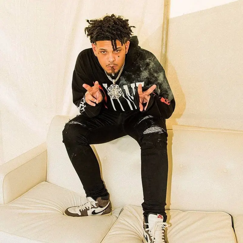 Smokepurpp outfit in Vlone, Amiri, and Palm Angels, 2019