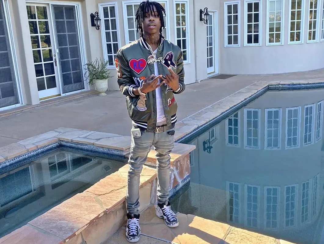 Polo G outfit in Stall & Dean, Louis Vuitton, and Nike, 2020