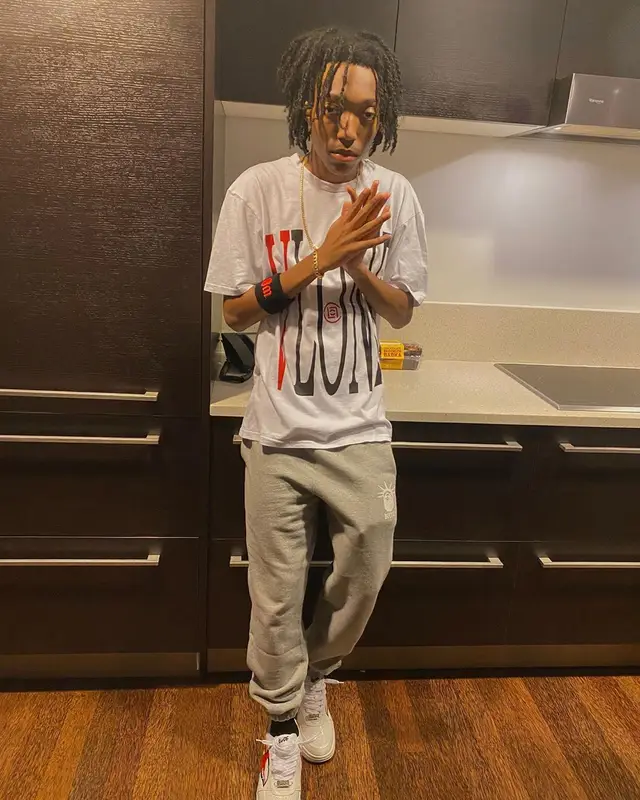 Lil Tecca outfit in Vlone, Bape, and Wilson, 2020