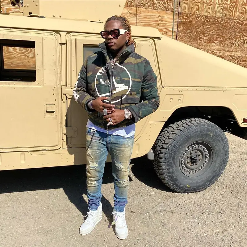 Gunna outfit in Rhude, Louis Vuitton, and Gucci, 2020