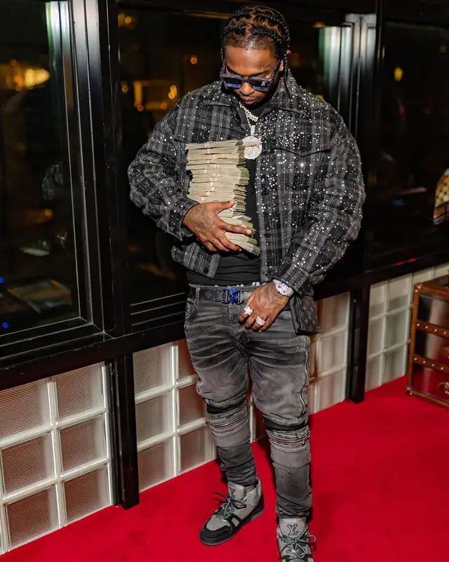Pop Smoke outfit in Amiri, Cartier, and Louis Vuitton, 2020