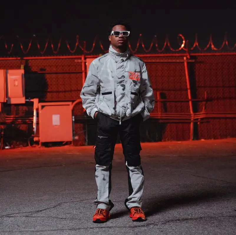 Roddy Ricch outfit in Heron Preston, Burberry, and Louis Vuitton, 2020