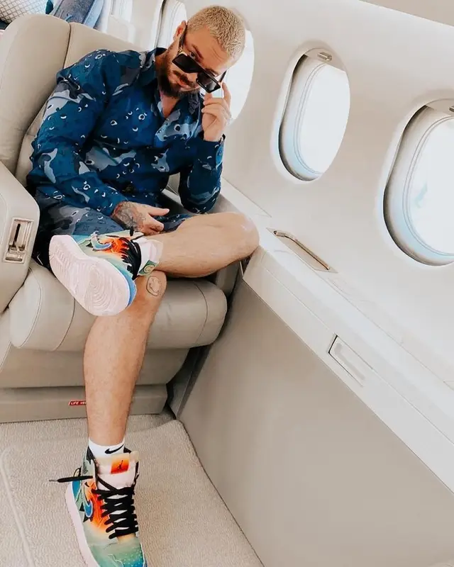 J Balvin outfit in Louis Vuitton, Jordan, and J Balvin Merch, 2020