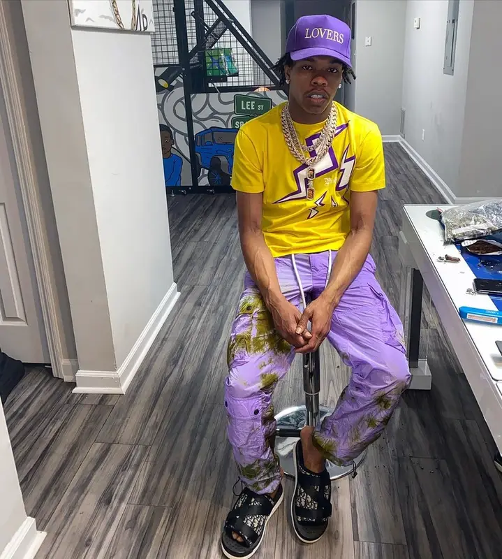 Lil Baby outfit in Prada, Palm Angels, and Amiri, 2020