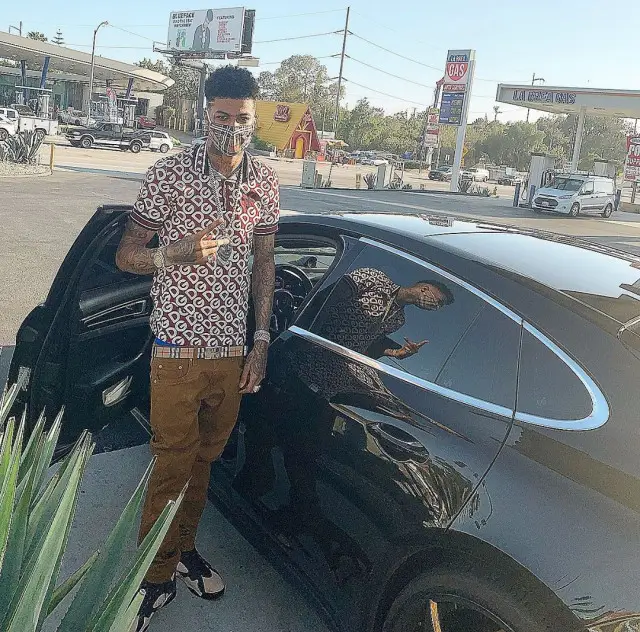 Blueface outfit in Dolce & Gabbana, Jordan, and Burberry, 2020