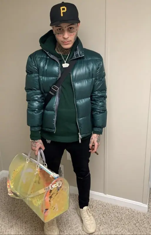 Lil Skies outfit in Armani Exchange, Louis Vuitton, and New Era, 2020