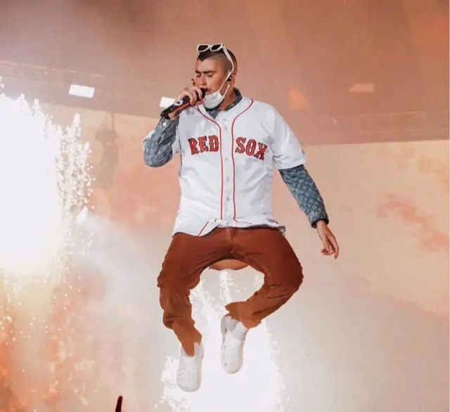 Bad Bunny outfit in Supreme, MLB, and Louis Vuitton, 2020