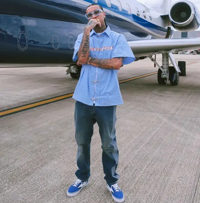 Tyga outfit in Storm, Louis Vuitton, and REVENGE, 2020