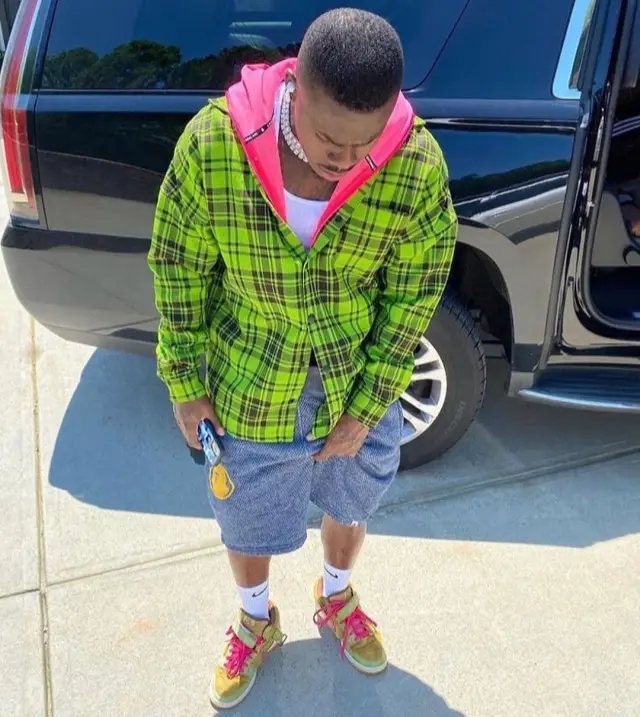 DaBaby outfit in Palm Angels, Bape, and Champion, 2020