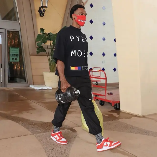 Rajon Rondo outfit in Pyer Moss, Nike, and Do Not Disturb., 2020