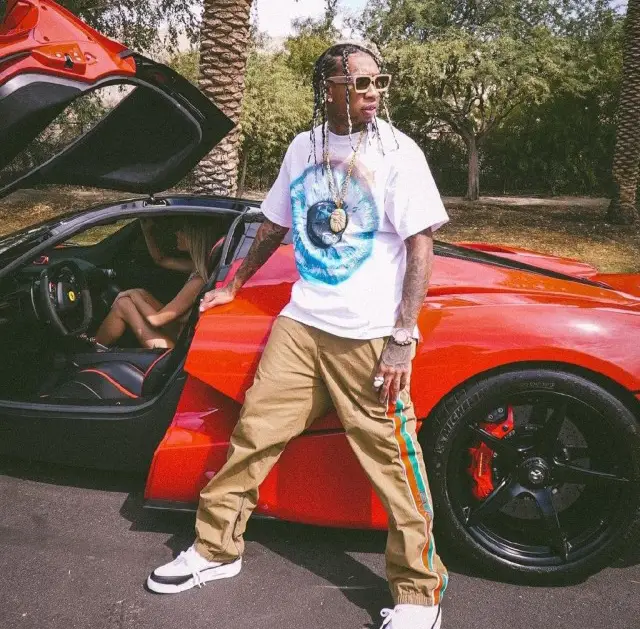 Tyga outfit in Gucci, Jordan, and Louis Vuitton, 2020