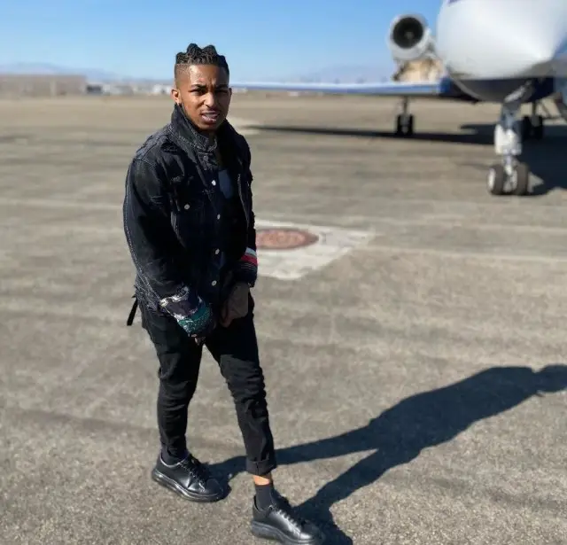 DDG outfit in Amiri, Ksubi, and Alexander McQueen, 2020