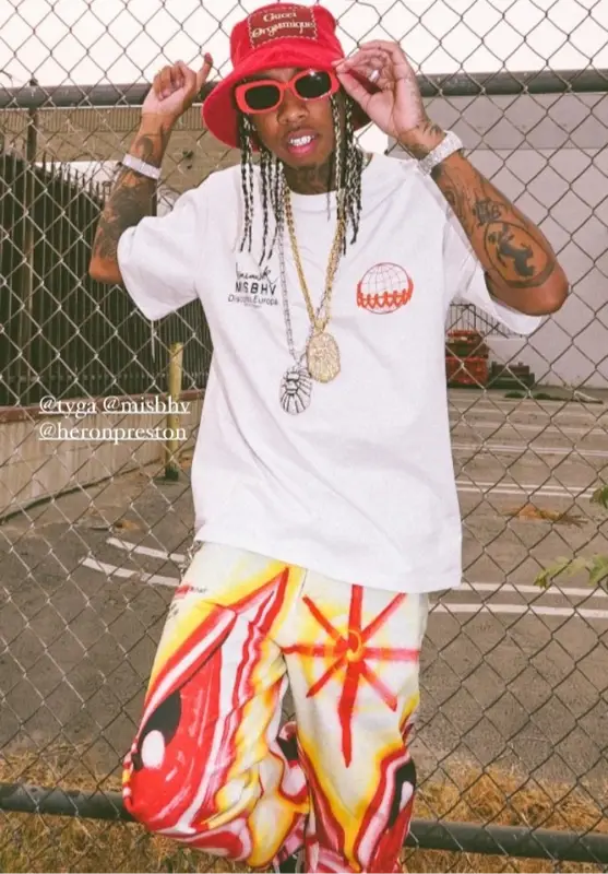 Tyga outfit in Misbhv, Heron Preston, and Kenny Scharf, 2020