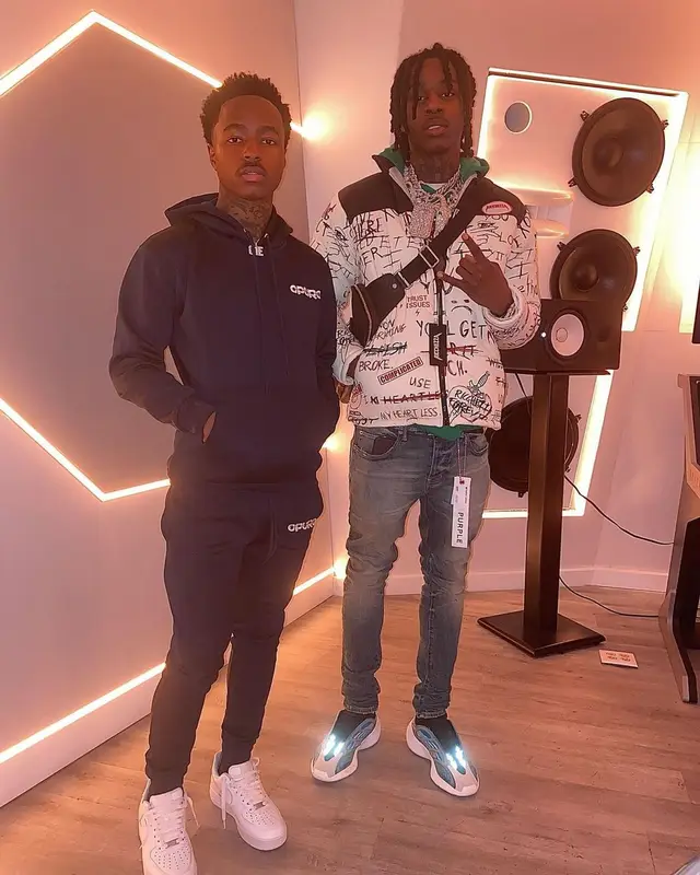 Polo G outfit in Ricchezza Forever, Purple Brand, and Louis Vuitton, 2020