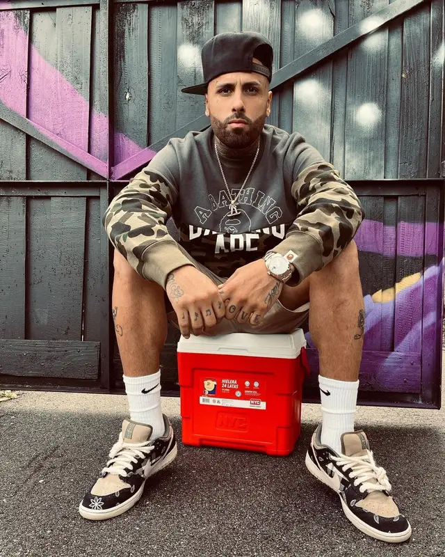 Nicky Jam outfit in Bape, Travis Scott Merch, and Nike, 2020