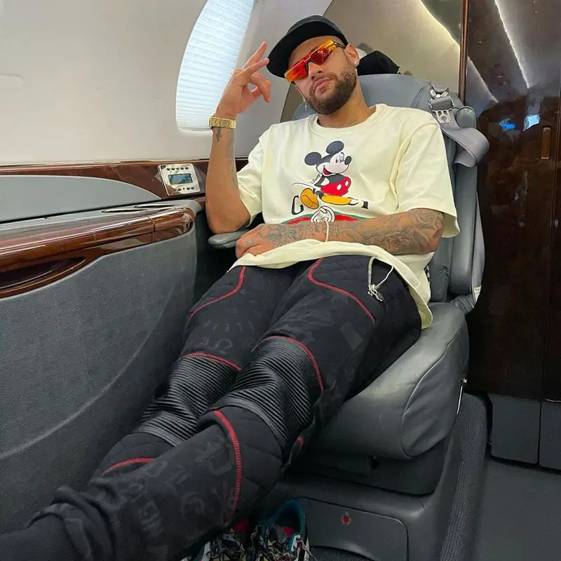 Neymar outfit in Gucci, Balenciaga, and Disney, 2021