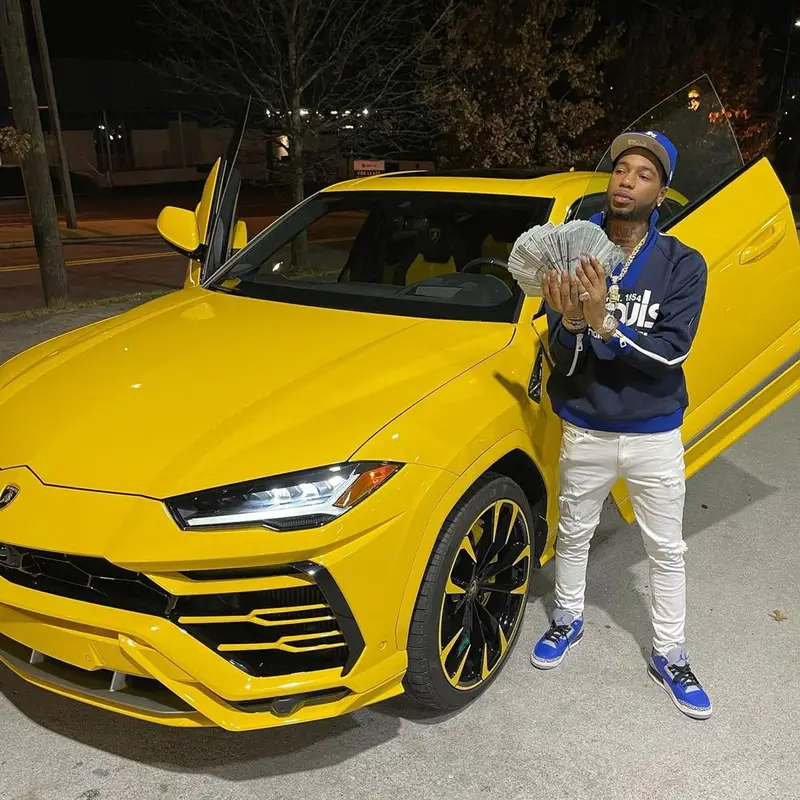 Key Glock outfit in Louis Vuitton, Jordan, and New Era, 2021
