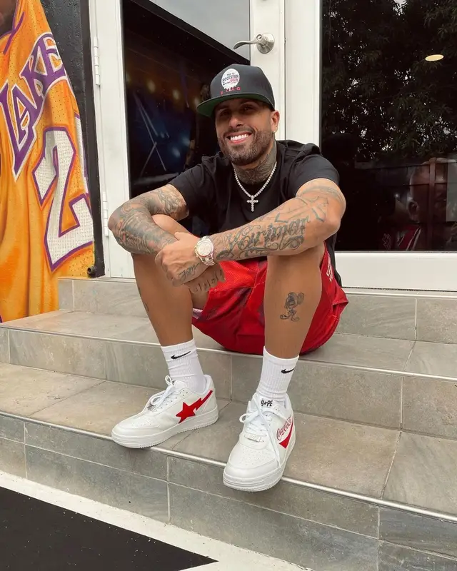 Nicky Jam outfit in Bape, Eric Emanuel, and Nike, 2021