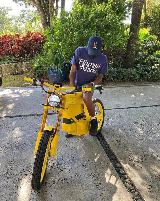 Pharrell Williams outfit in Human Made, Nigo, and Adidas, 2021