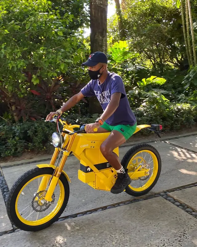 Pharrell Williams outfit in Human Made, Nigo, and Adidas, 2021