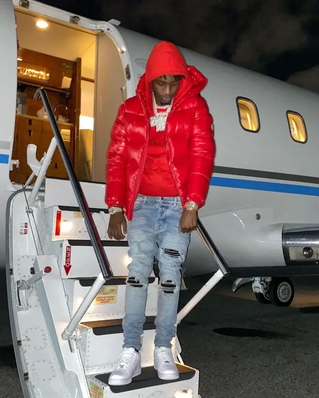 Lil Tjay outfit in Moncler, Dior, and Amiri, 2021