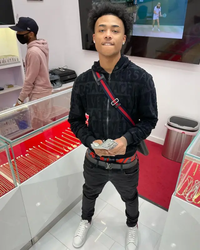 Luh Kel outfit in Versace, Louis Vuitton, and Gucci, 2020