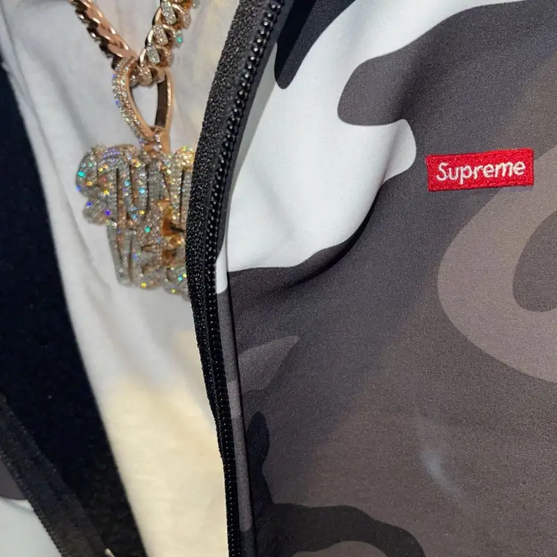 Stunna 4 Vegas outfit in B.B. Simon, Supreme, and New Era, 2021