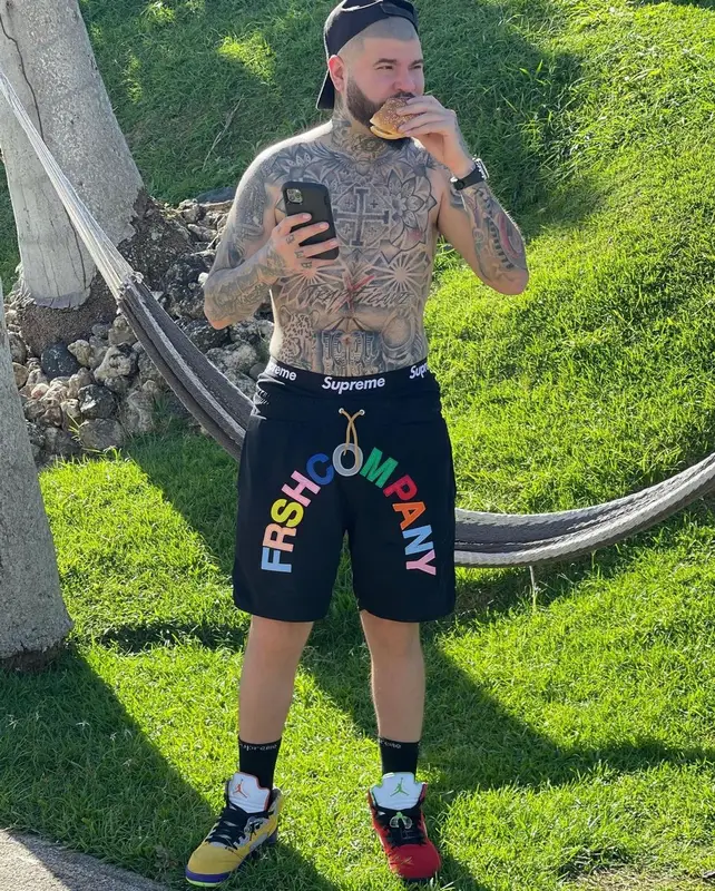 Farruko outfit in Jordan, Fendi, and Supreme, 2021