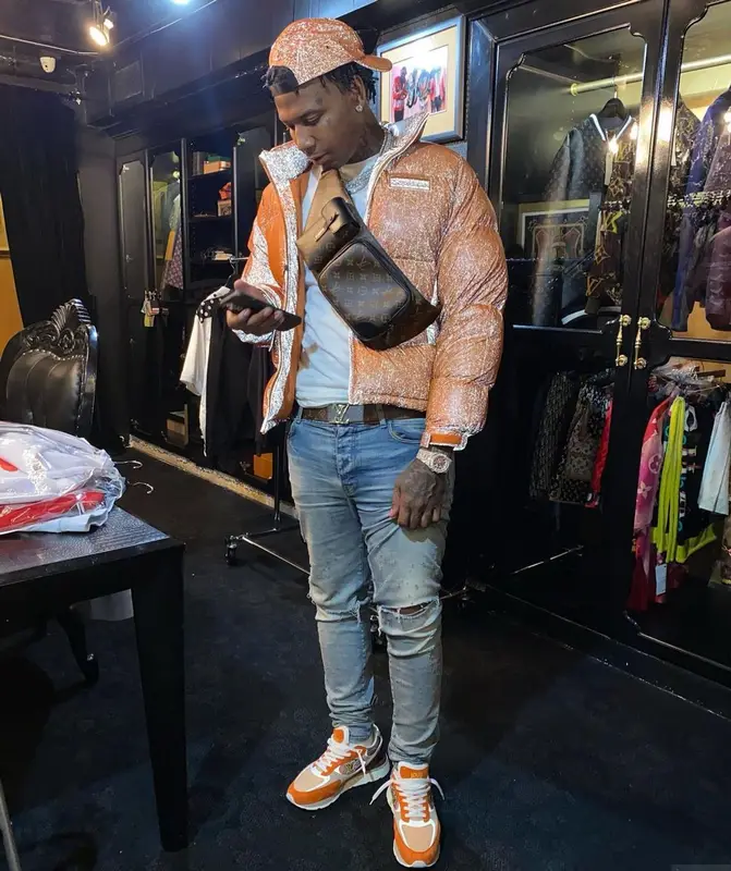 Moneybagg Yo outfit in Amiri, Louis Vuitton, and Supreme, 2021