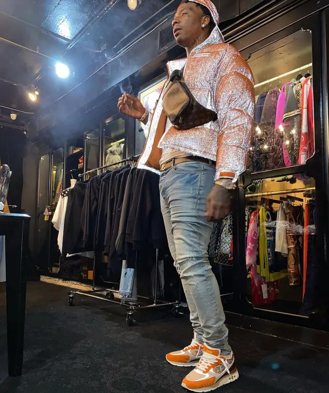 Moneybagg Yo outfit in Amiri, Louis Vuitton, and Supreme, 2021
