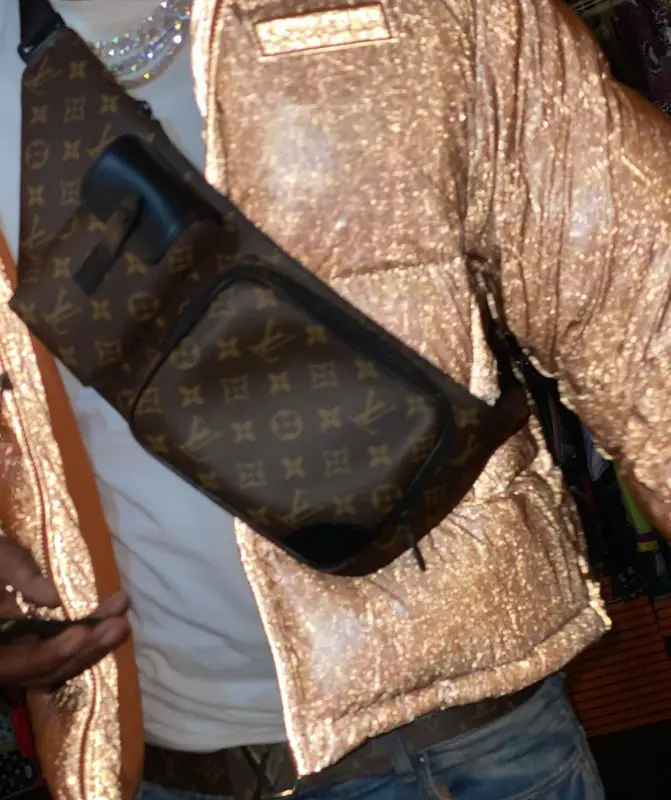 Moneybagg Yo outfit in Amiri, Louis Vuitton, and Supreme, 2021