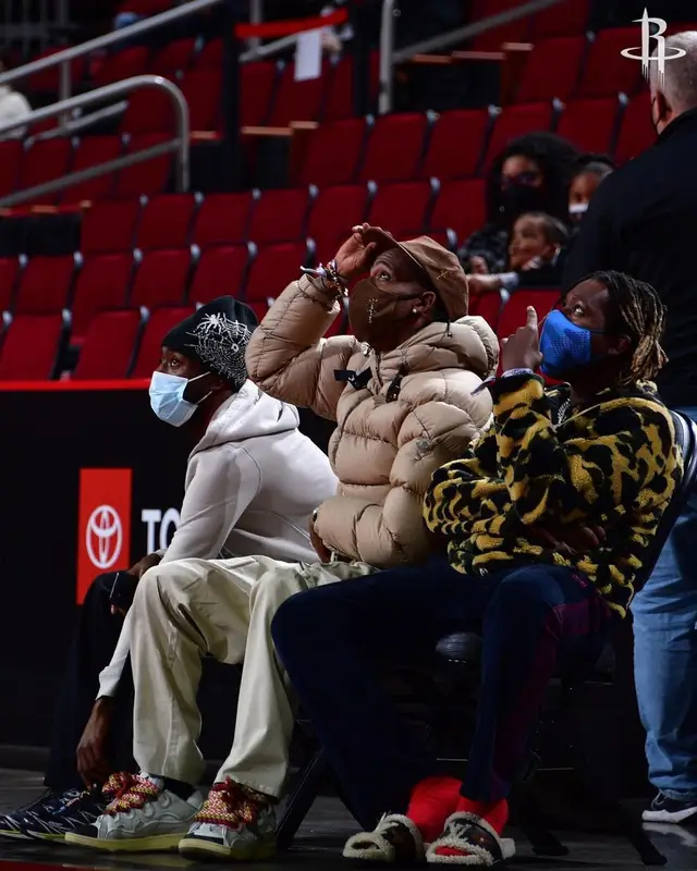 Travis Scott outfit in Travis Scott Merch, McDonald's Merch, and Cactus Jack, 2021